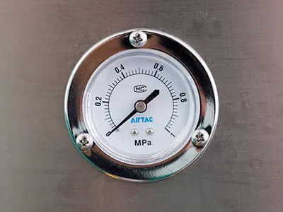 Sistema de agarre, tolva de producto, sistema de tranpsorte, unidad de llenado