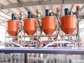 Envasadora de bolsas prefabricadas, llenado con 4 boquillas
