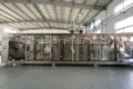 Envasadora de bolsas prefabricadas, llenado con 1 boquilla