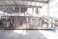Envasadora de bolsas con boquilla (spout) por servo motor, llenado con 2 boquillas